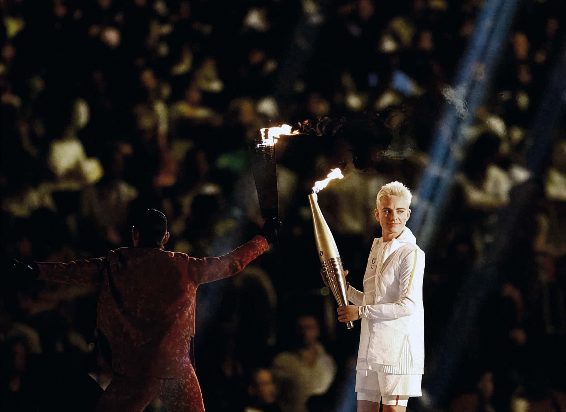 Bebe holding the Olympic flame