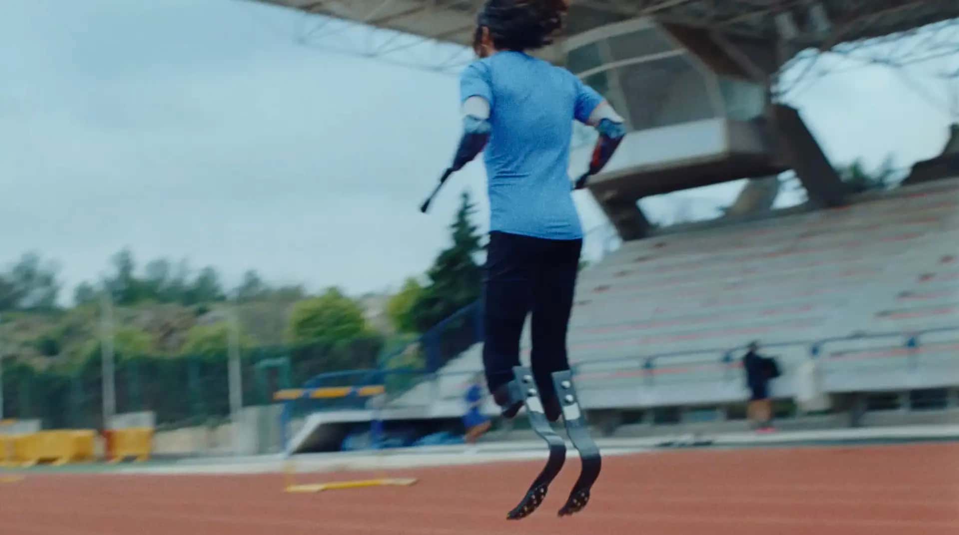 David on a track and field with his prosthetic limb
